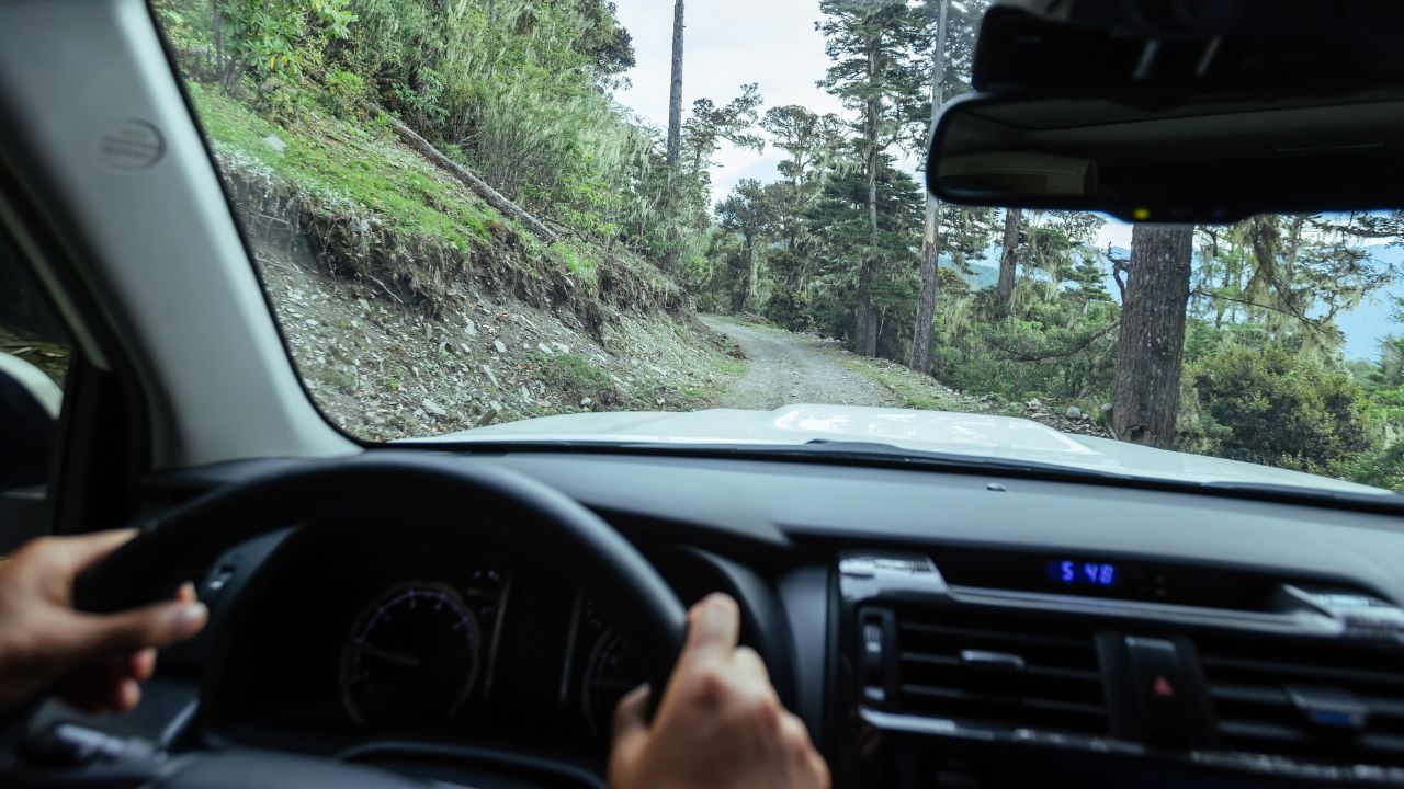 Driving off road car in high altitude mountains