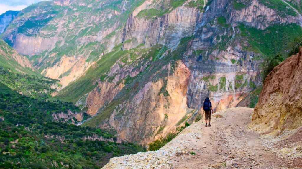 Canyon Colca and man on a rock