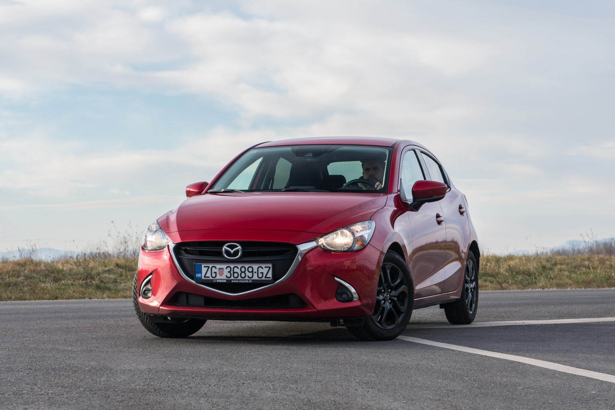 red mazda 2