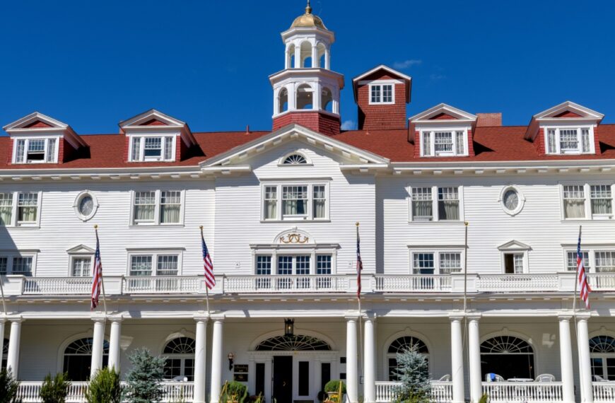 Estes Park, Colorado, USA - September 22, 2019: A closeup wide-angle view of the front facade of the famous Stanley Hotel on a bright sunny Autumn day.