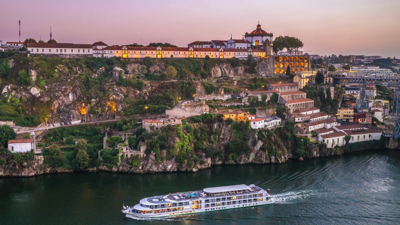 scenery by douro river in porto, portugal at dusk