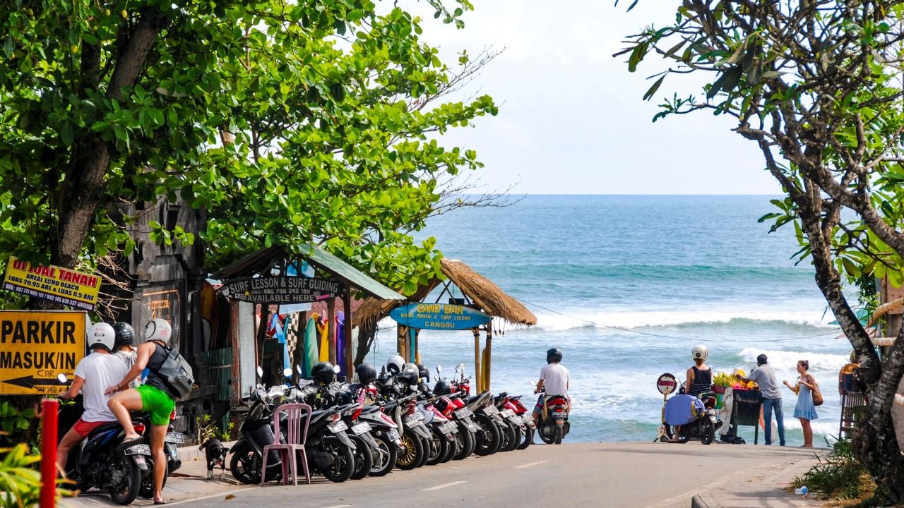Bali, Indonesia - January 9 2017: Vibrant street scene on the main road of Canggu leading to the beach