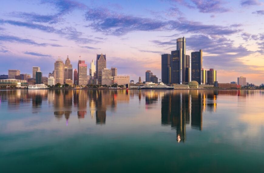 Detroit, Michigan, USA skyline at dawn on the Detroit River.