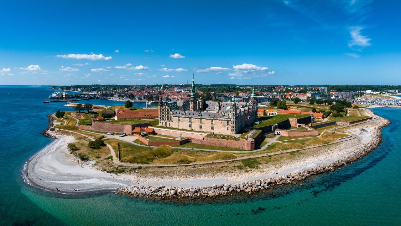 Helsingør, Denmark. May 10, 2023. Aerial view of Kronborg castle with ramparts, ravelin guarding the entrance to the Baltic Sea and the Oresund in Helsingor Denmark