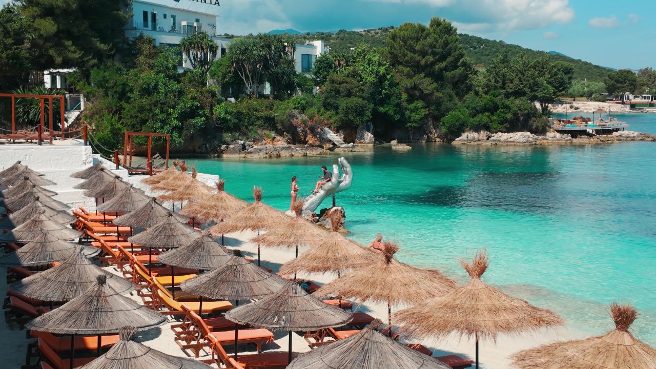Ksamil, Albania - Jun 21, 2025: People enjoy summer holiday destination in Ksamil, Saranda, Albania
