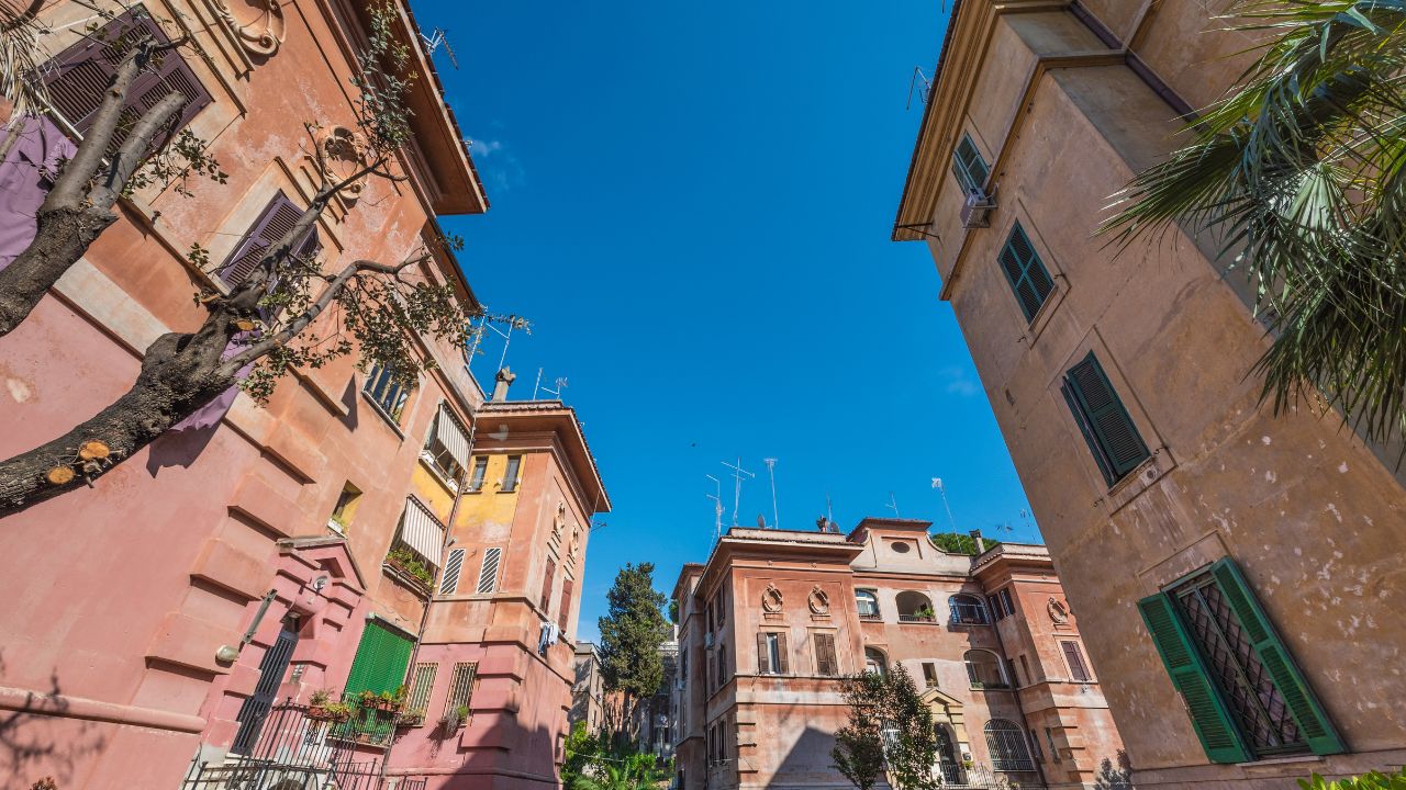 ROME, ITALY - 15 APRIL 2017 - The suggestive popular Garbatella quarter in Ostiense district, an agglomeration in Rococo style with gardens and the famous modern bridge named Settimia Spizzichino