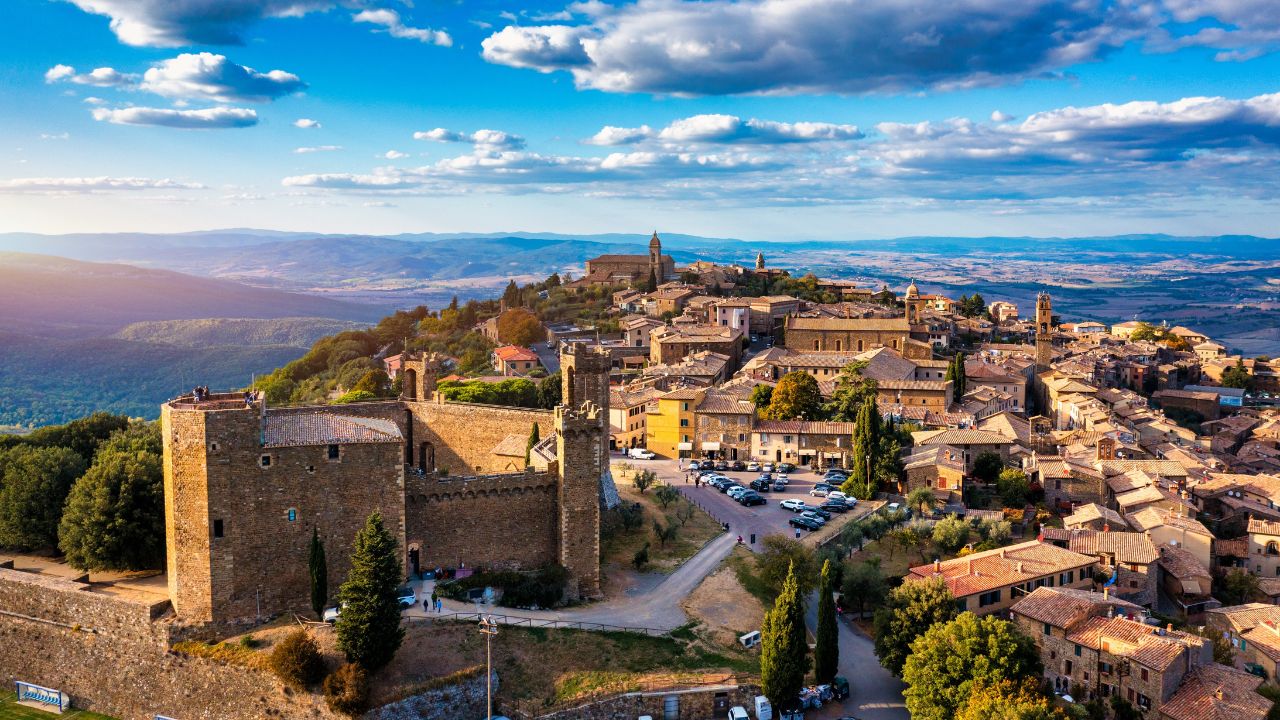 View of Montalcino town, Tuscany, Italy. The town takes its name from a variety of oak tree that once covered the terrain. View of the medieval Italian town of Montalcino. Tuscany