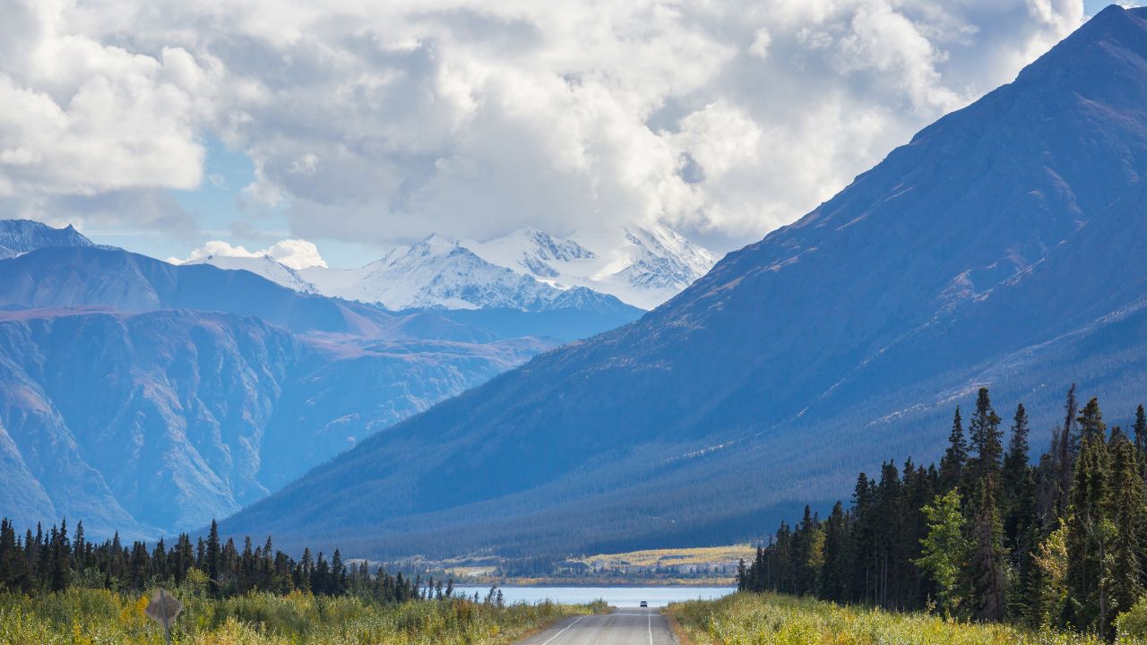 Scenic highway in Alaska, USA. Dramatic view clouds