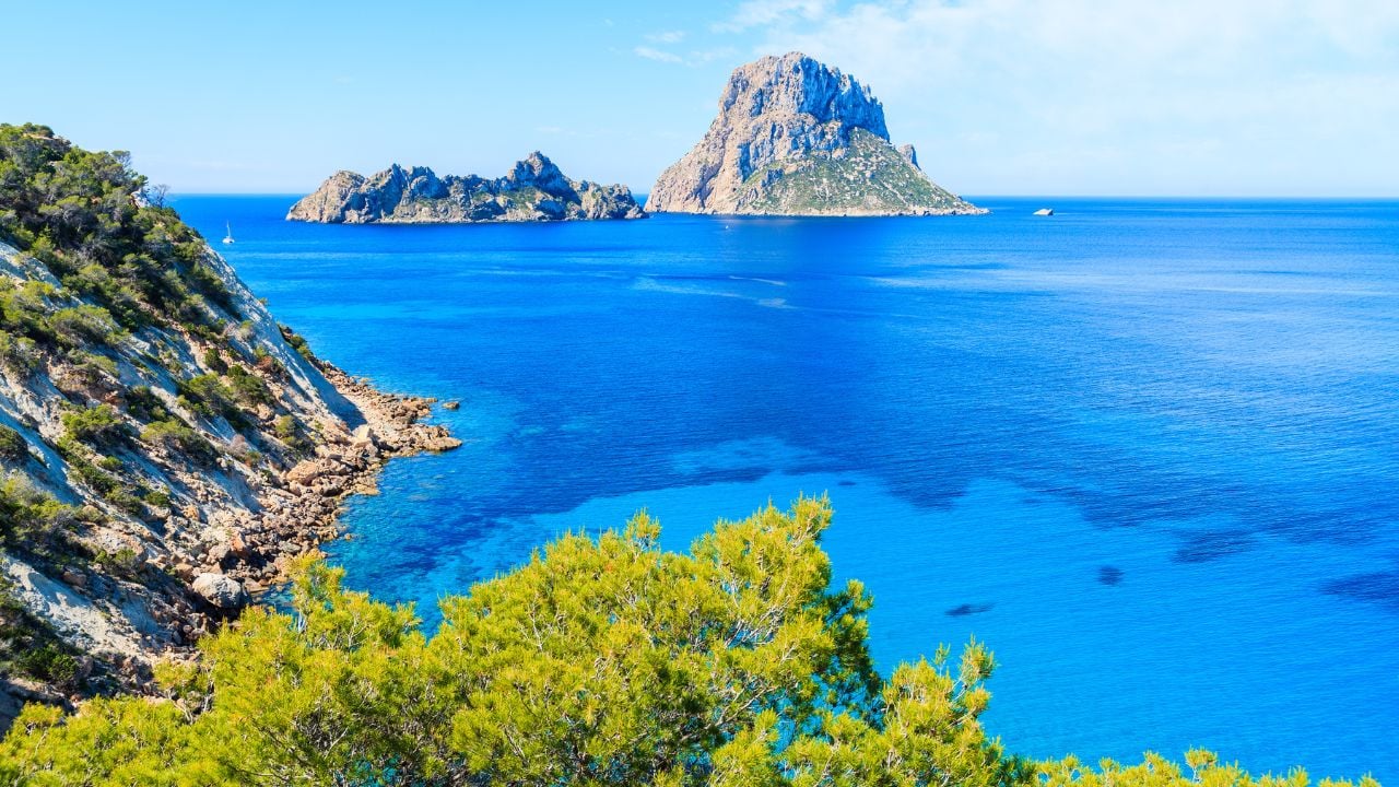 Cala d'Hort bay and Es Vedrà island in Ibiza, Spain