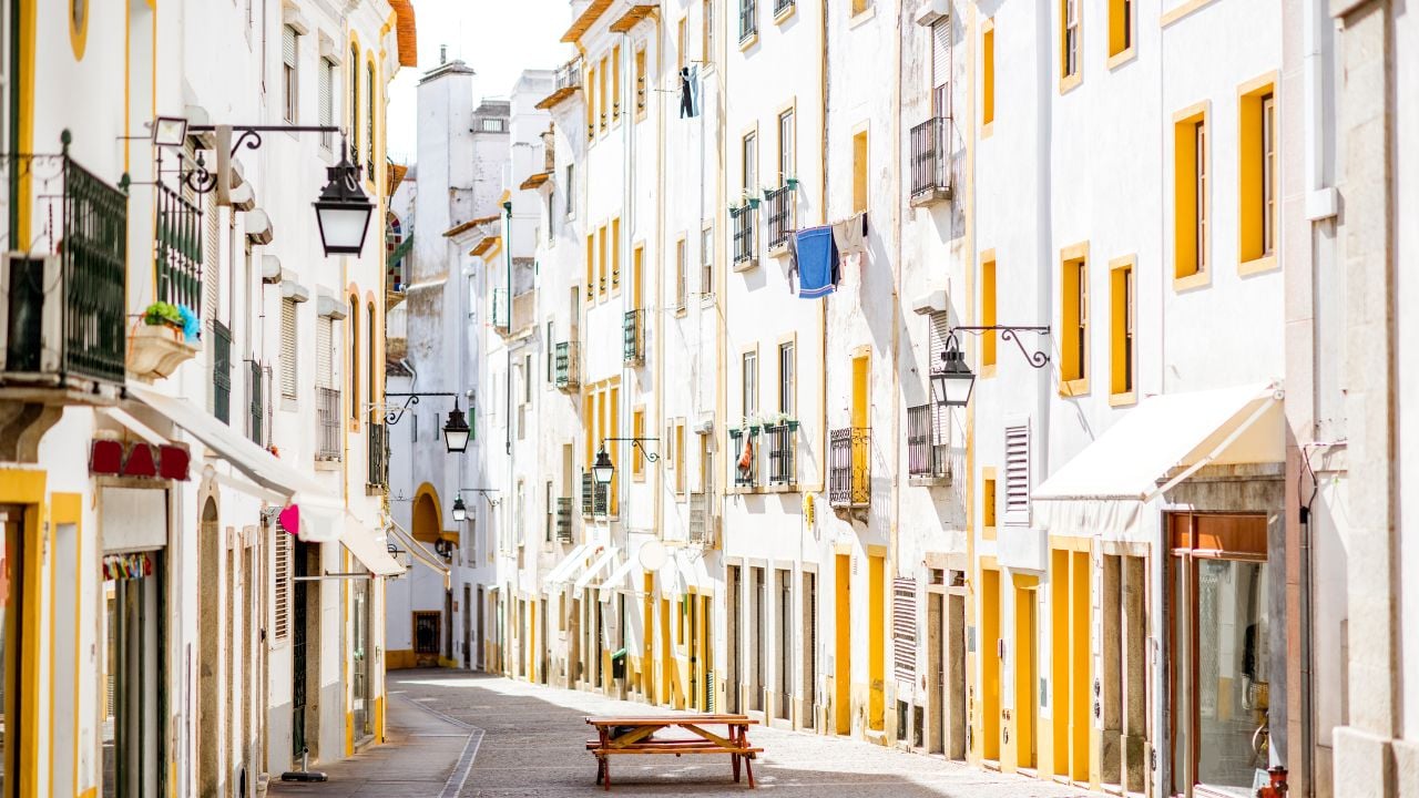 Street view with old residential buildings in Évora, Portugal