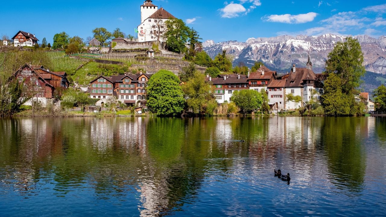 Pretty town of Werdenberg in Liechtenstein surrounded by high mountains