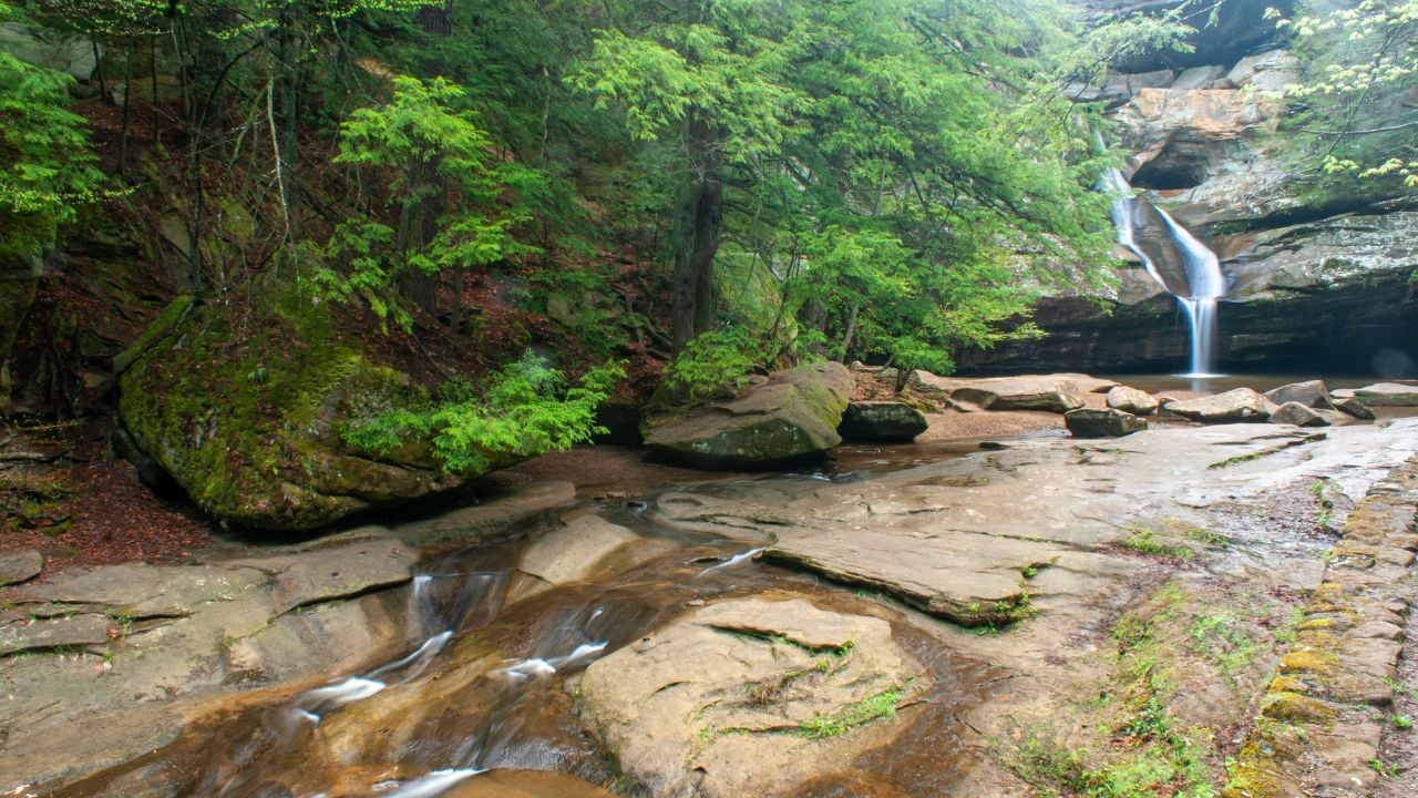 a view of Cedar falls from Queer Creek in Hocking Hills State Park outside Logan Ohio A beautiful rock bottom creek and Falls