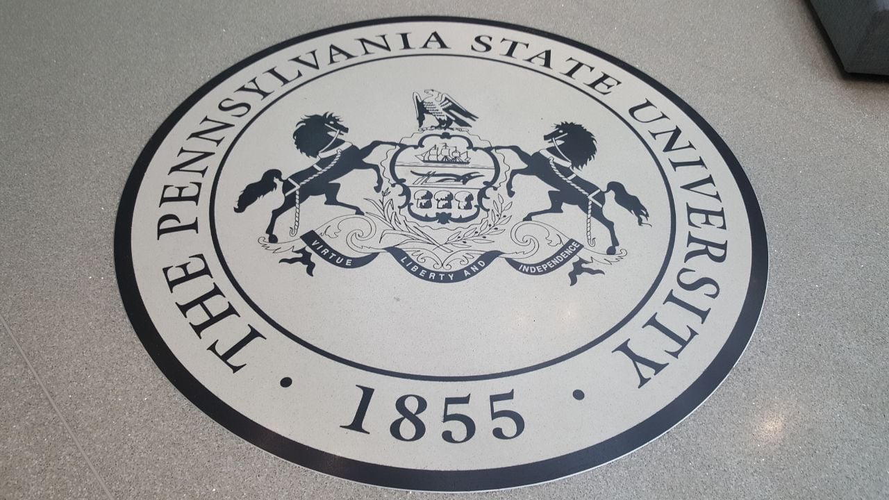 STATE COLLEGE, PENNSYLVANIA, US - January 5, 2019: The Penn State University seal adorns the floor of the HUB-Robeson Center.
