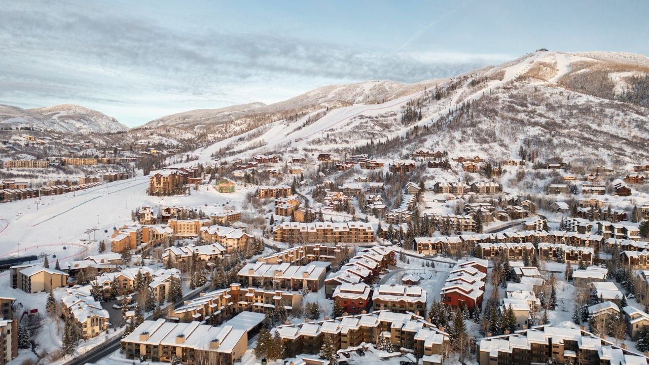 Panorama view of Steamboat Springs, Colorado mountain skiing and snowboarding resort town with Mt. Werner landscape in background