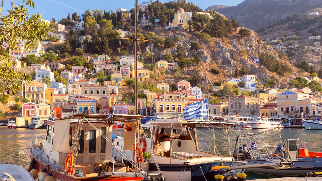 Fishing boat in harbor of Symi, Greece