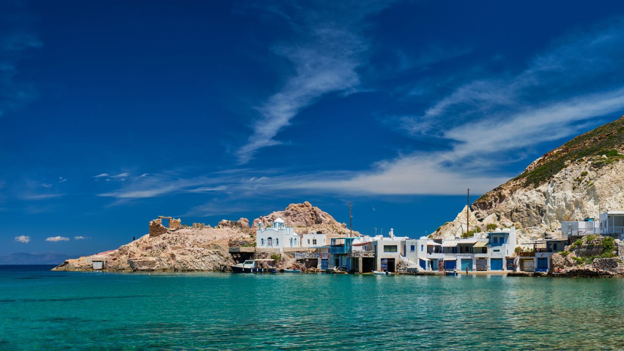 Panorama of the beach and fishing village of Firapotamos in Milos island, Greece