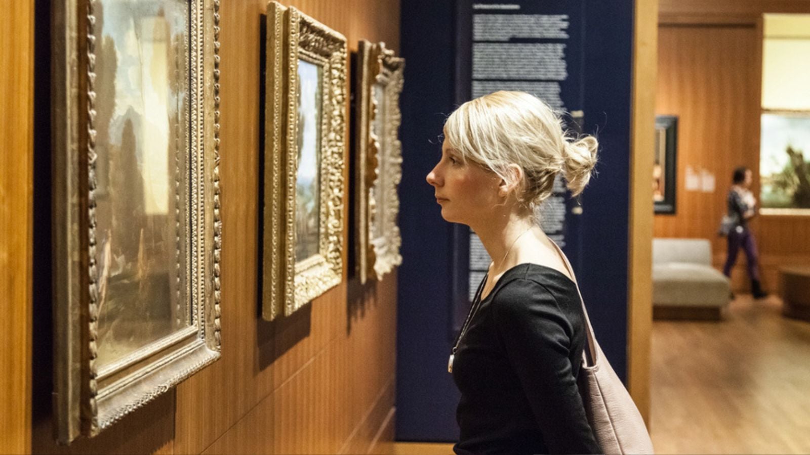 Editorial-Montreal-Canada-Montreal-Fine-Arts-Museum-Room-with-Paintings-on-the-wall-and-woman-looking-at-it