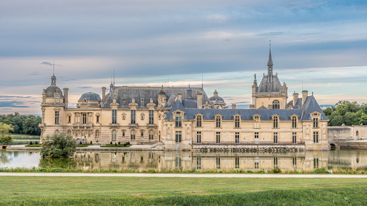 Chantilly, France - 07 August 2024: Outside the castle of Chantilly, jewels of the French heritage in Picardy.