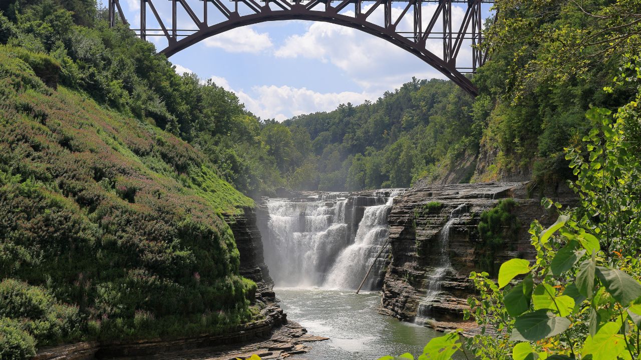 Upper falls of Letchworth State Park in upstate New York. Train trestle appears in the background.