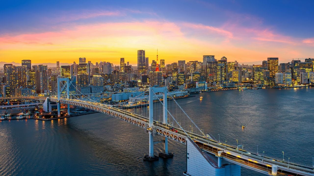 Rainbow Bridge and Tokyo cityscape at sunset
