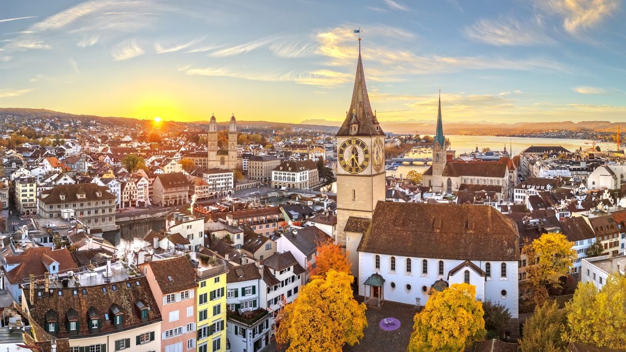 Zurich, Switzerland old town skyline over the Limmat River on an autumn morning.