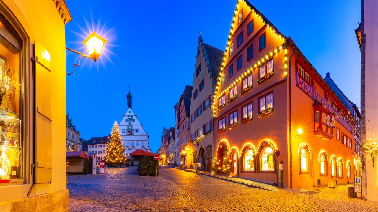 Decorated and illuminated Christmas street and Market square in medieval Old Town of Rothenburg ob der Tauber, Bavaria, southern Germany