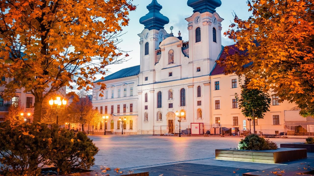 Astonishing evening view of Gyor Benedictine Church of St. Ignatius of Loyola. Beautiful autumn cityscape of Gyor town, capital of Gyor-Moson-Sopron County and Western Transdanubia region, Hungary.