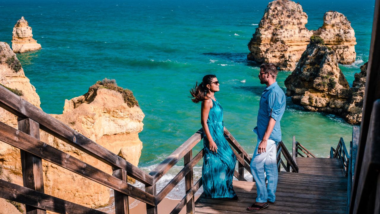 Happy Young couple during vacation at the Algarve coast Portugal