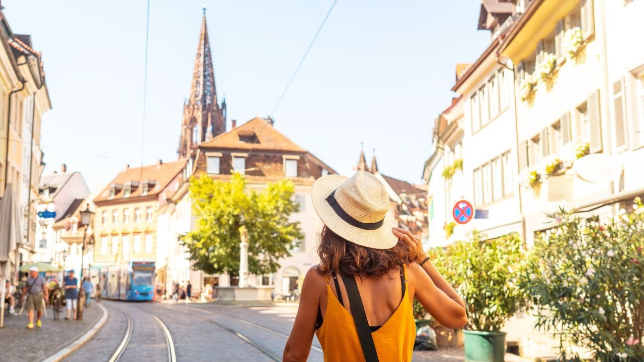 Walking past the Freiburg Minster in the city of Freiburg im Breisgau, Germany