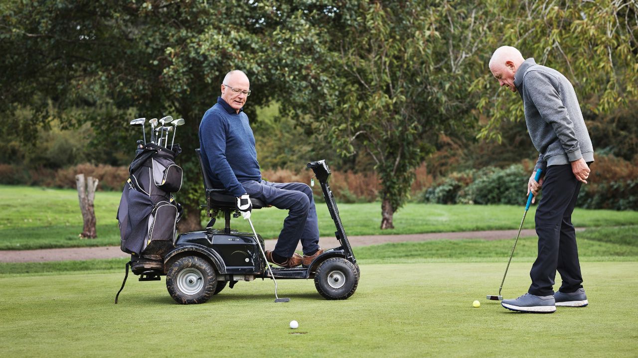 Elderly, men and golf on grass, sports together and retirement with club and play game on field. Ready for swing, exercise and wellness, active pensioner friends outdoor and cart for moving around