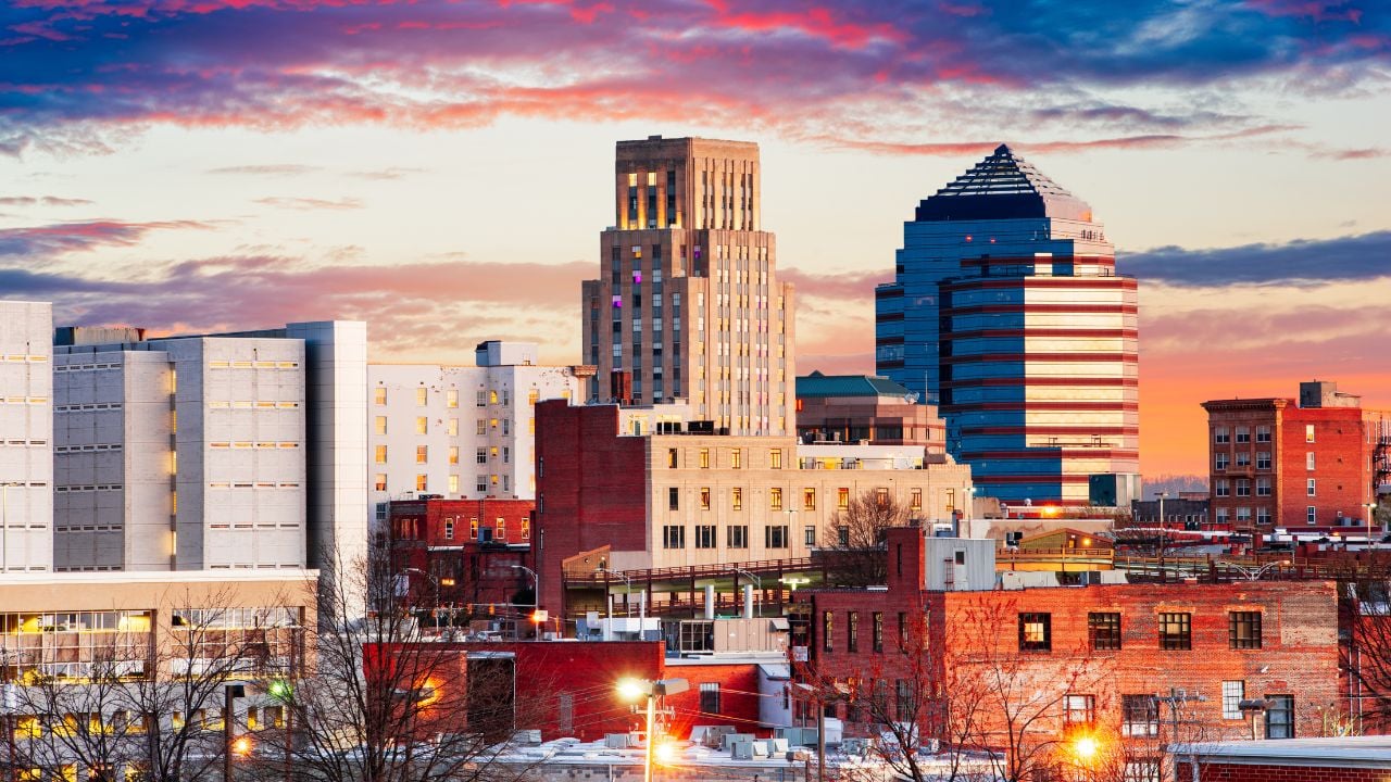 Durham, North Carolina, USA downtown skyline at dawn.