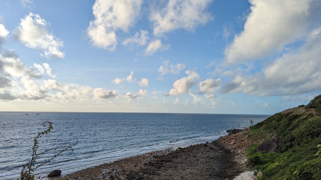 Idyllic view of rugged shore of Con Dao Island in pacific Ocean in Vietnam