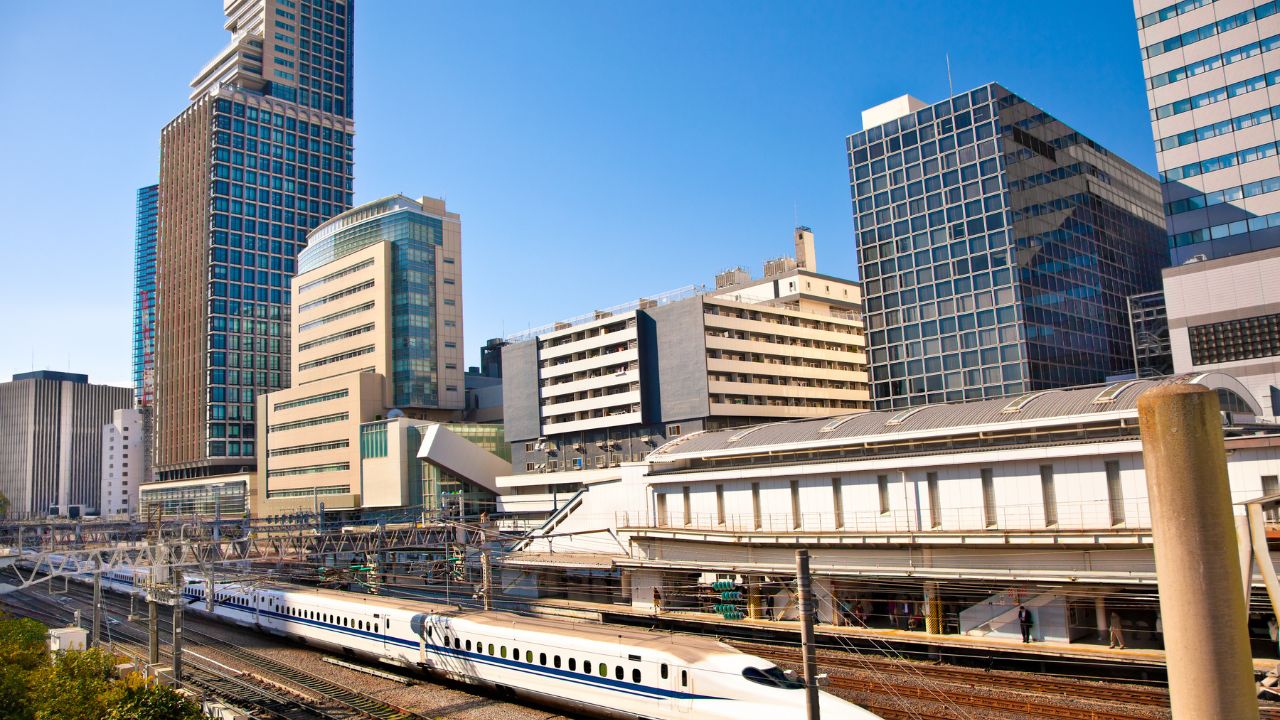 Railway with skyline shinkansen at Odaiba ,Tokyo, Japan. Shinkansen is world's busiest high-speed railway operated by four Japan Railways companies.