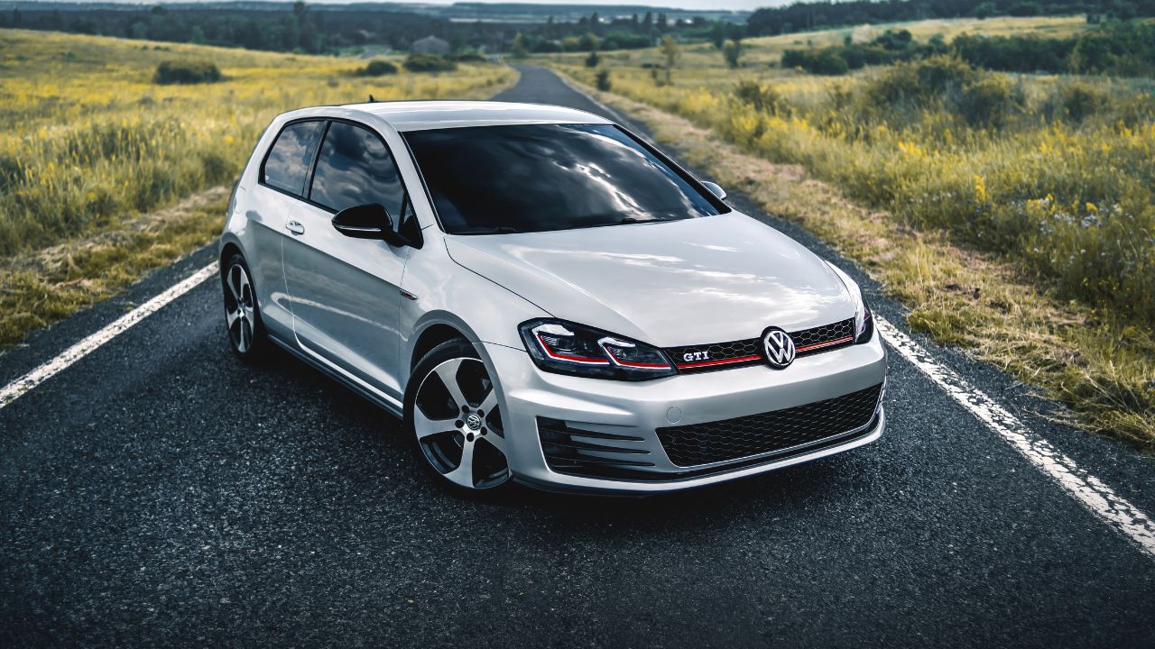 Kharkiv, Ukraine - Hot hatch Volkswagen Golf GTI Mk7 on the empty road