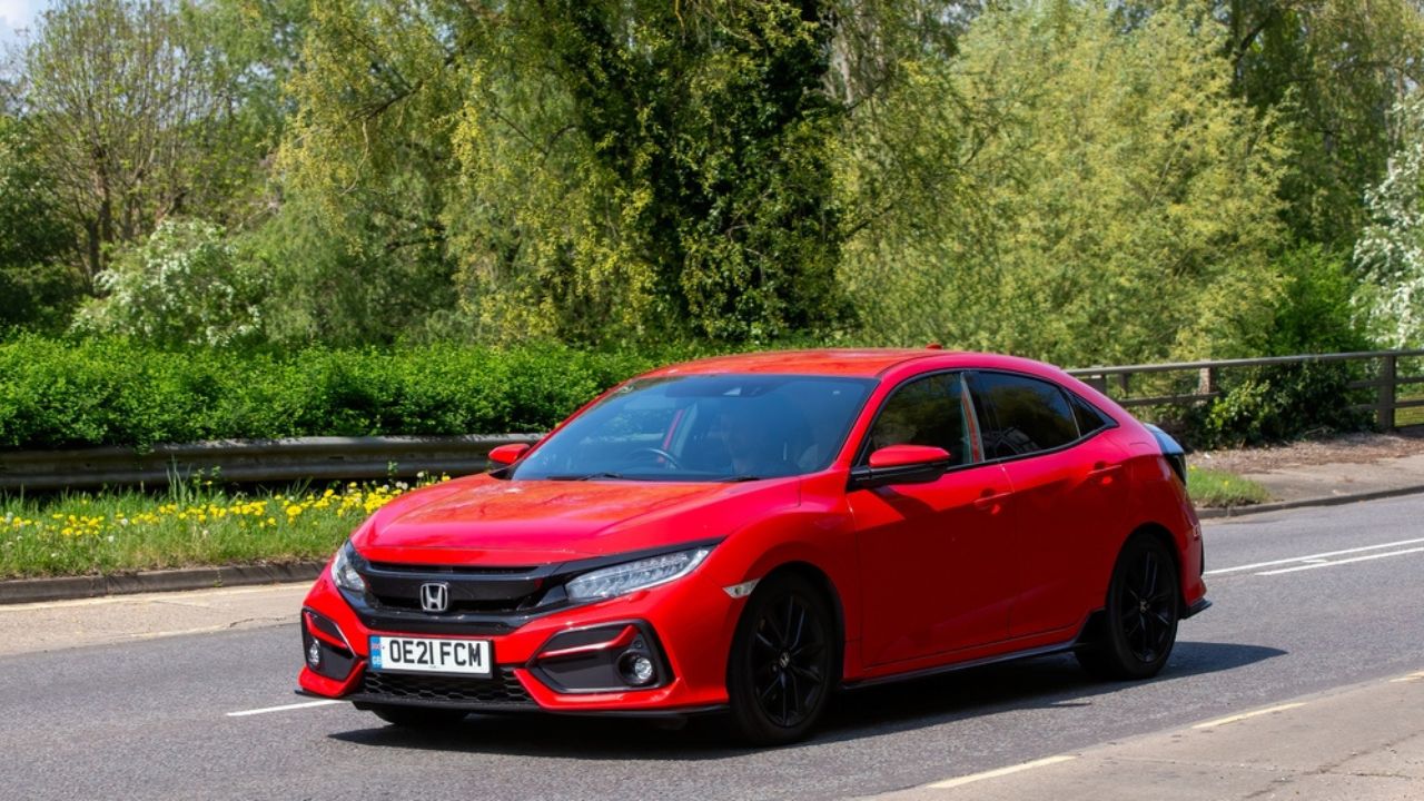 Milton Keynes,Bucks.,UK - 2021 red Honda Civic sport car on an English road.