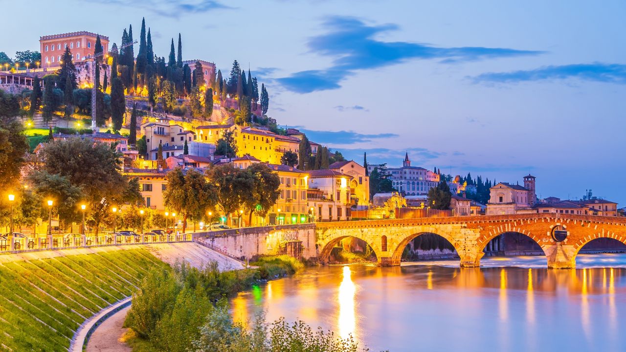 Verona city downtown skyline, cityscape of Italy at sunset