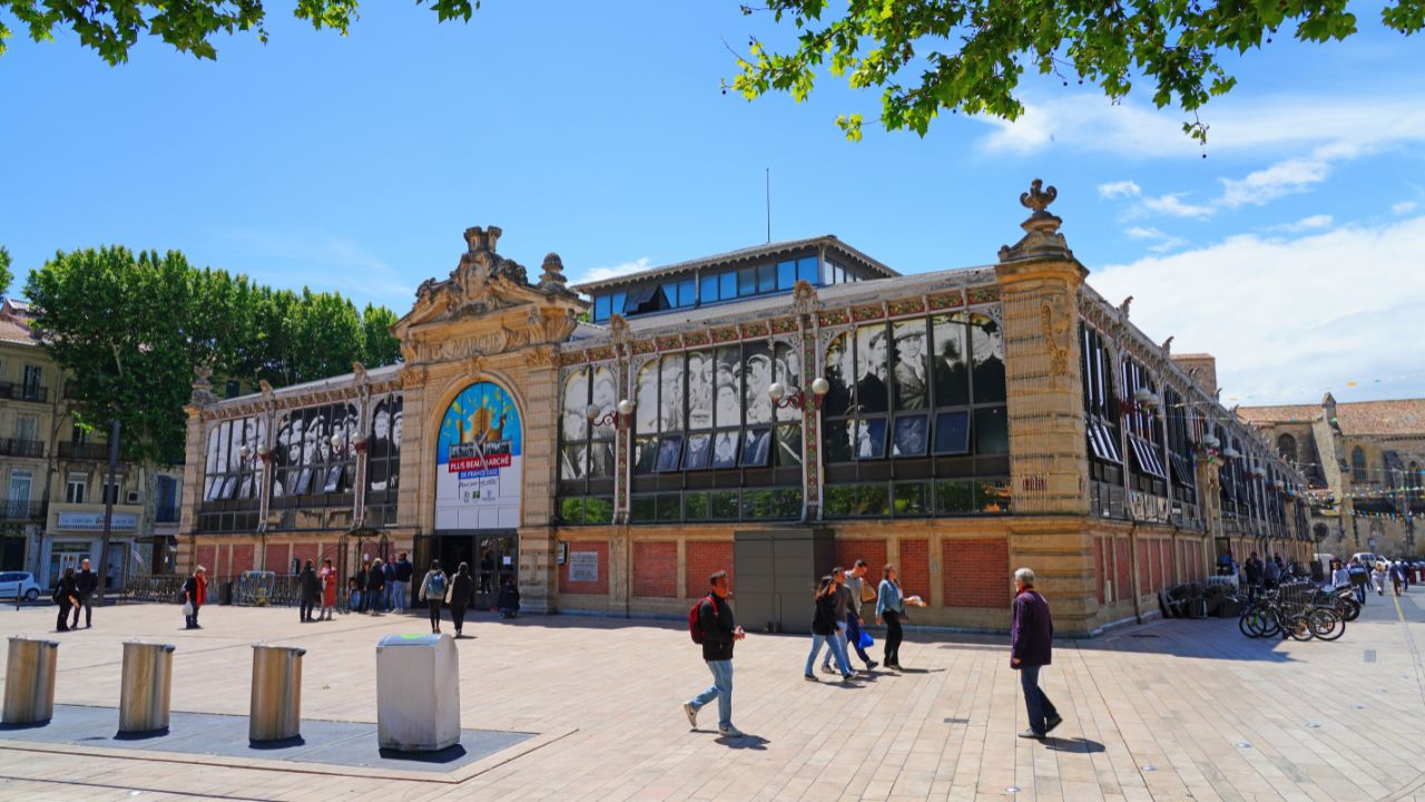 NARBONNE, FRANCE – 5 MAY 2023 – View of Les Halles de Narbonne, a landmark covered market and food court in the Occitanie region of Southern France.