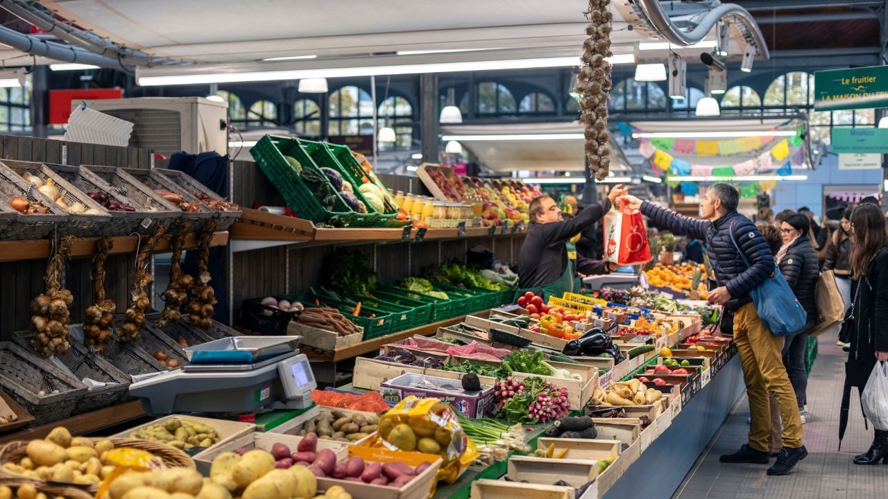 LILLE - France - 11-05-2023: Vegetable stand at Marché de Wazemmes, a traditional place to shop for fresh products.