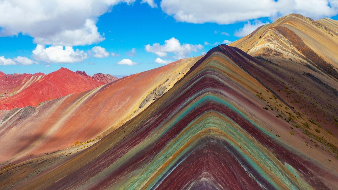 Hiking scene in Vinicunca, Cusco Region, Peru. Rainbow Mountain (Montana de Siete Colores).