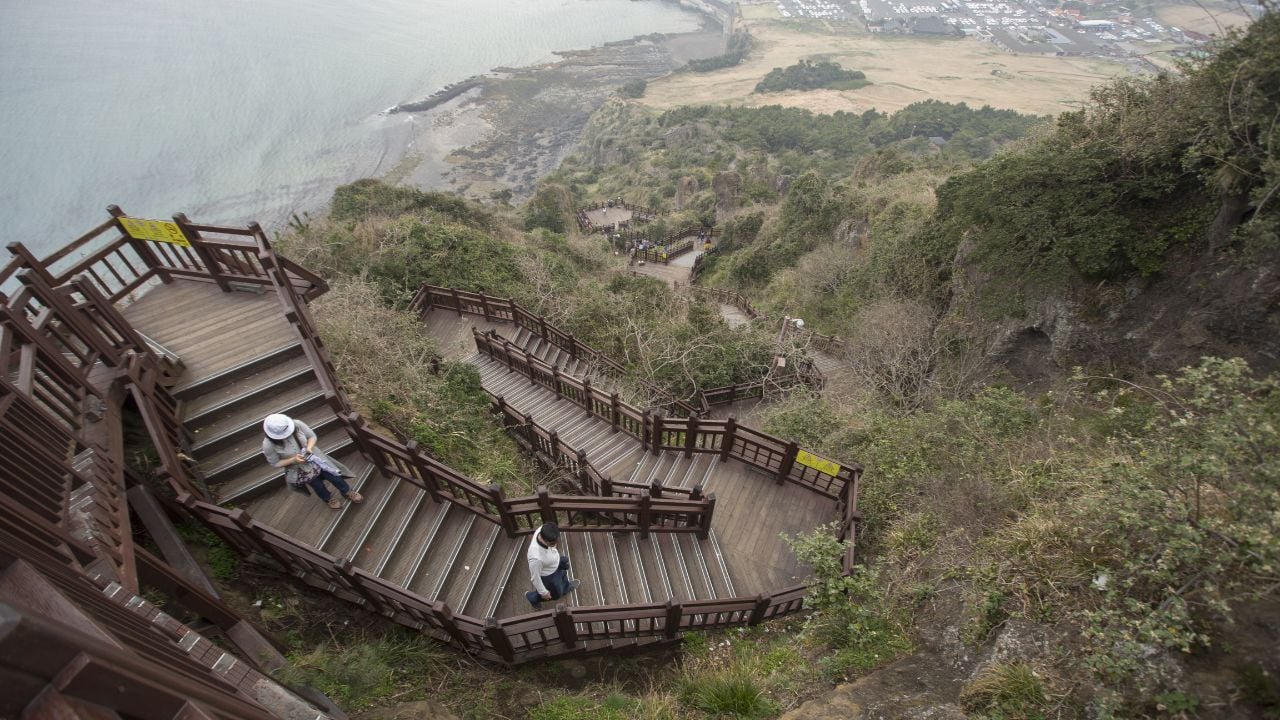 The view from Seongsan Ilchulbong, also called 'Sunrise Peak', is an archetypal tuff cone formed by hydrovolcanic eruptions.