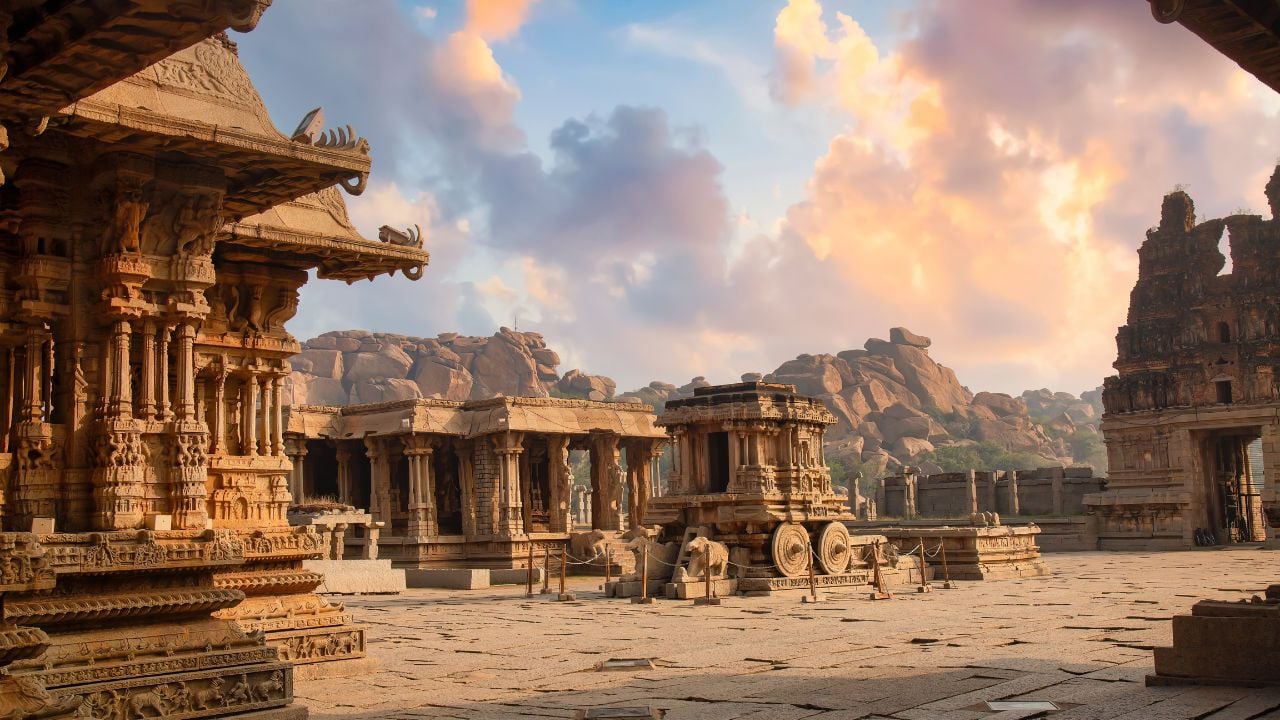Ancient architecture ruins at the Vijaya Vittala temple built in the 15th century AD at sunset at Hampi Karnataka, India