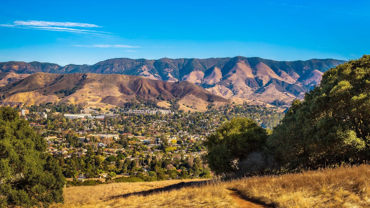 Aerial view of San Luis Obispo in California from the hiking trail to Cerro Peak. Cerro is part of the chain of peaks called the Nine Sisters and is popular for hiking, jogging and mountain biking.