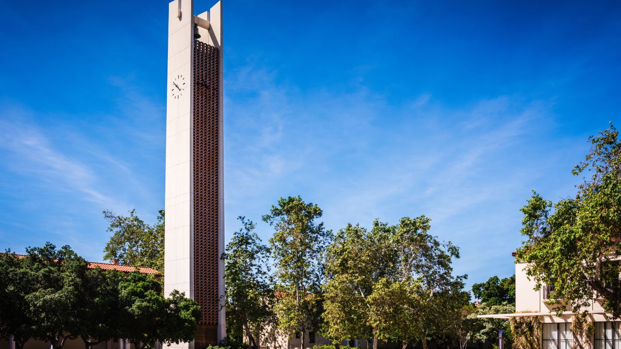 Claremont, California USA - March 30, 2017: Smith Clock Tower rises above Clark III hall on the Pomona College Campus.