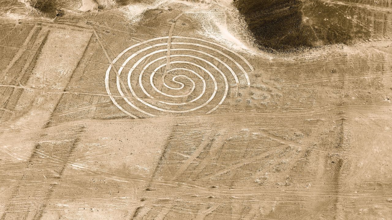 Nazca lines drawing geoglyph of the spiral, Nazca desert, Peru.