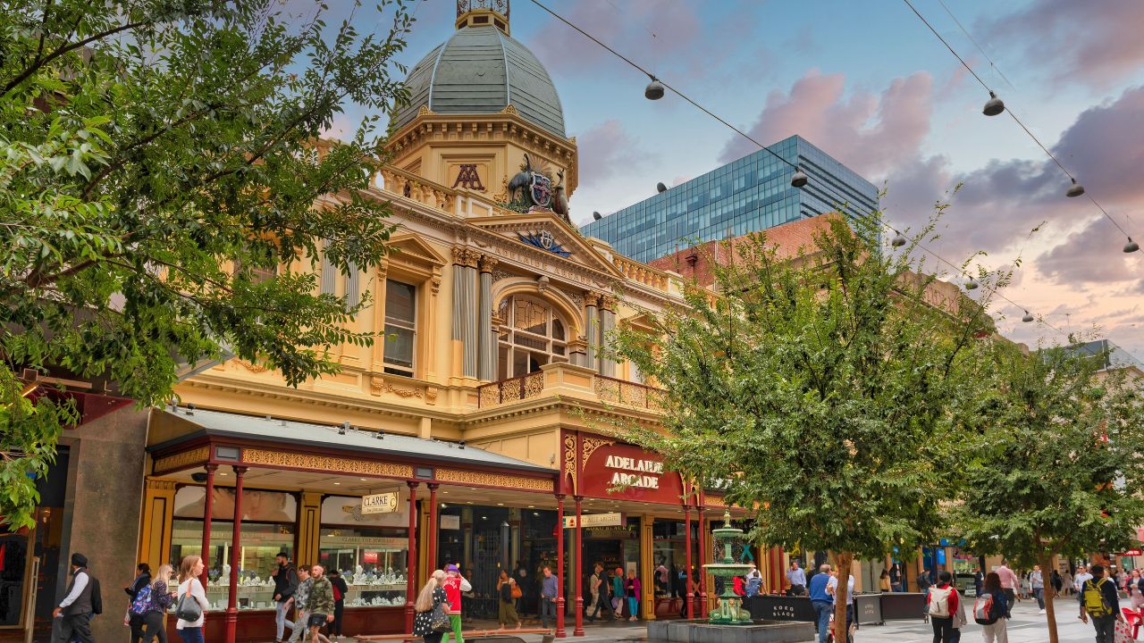 ADELAIDE, AU - Feb 20, 2019: A bustling town square with people walking around the buildings in Adelaide, Australia