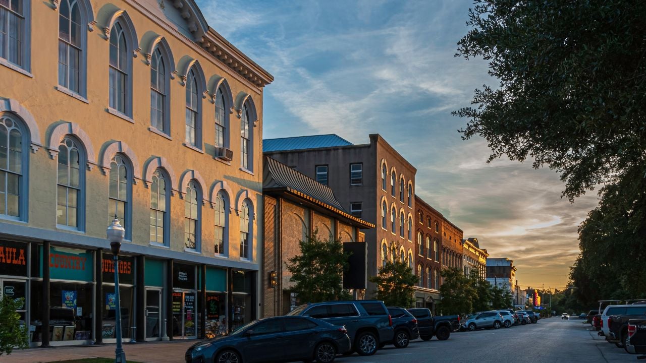 Eufaula, Alabama, USA - August 13, 2022: Dramatic view of historic buildings in downtown Eufaula in golden hour lighting.