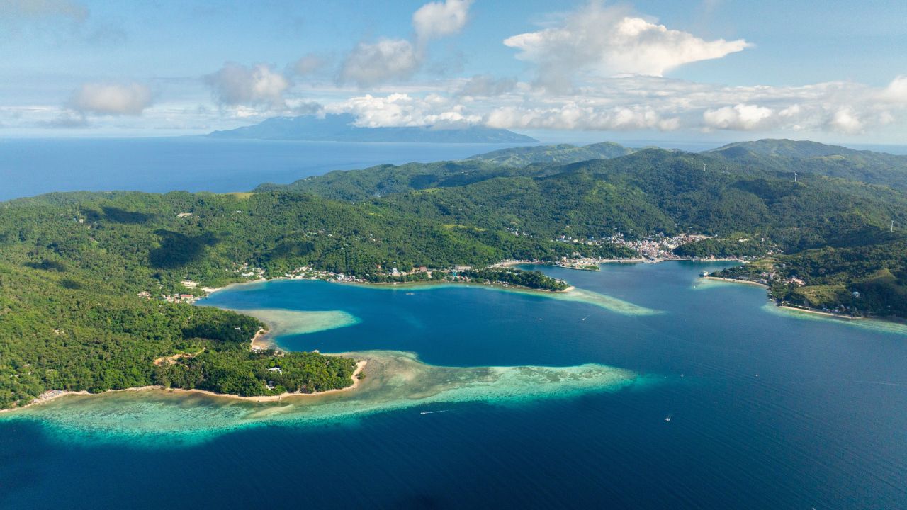 Scenic landscape of Romblon Island with coastal town city. Romblon, Philippines.