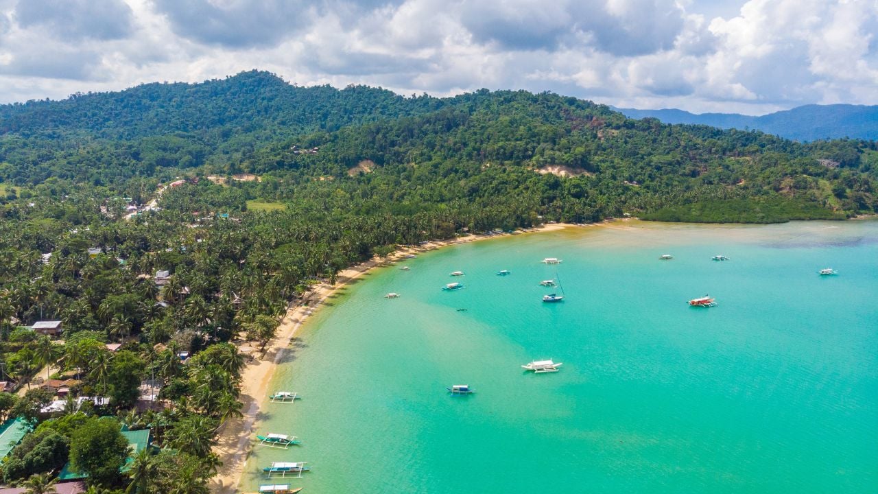 Aerial view of Port Barton Beach on paradise island, tropical travel destination - Port Barton, San Vicente, Palawan, Philippines.