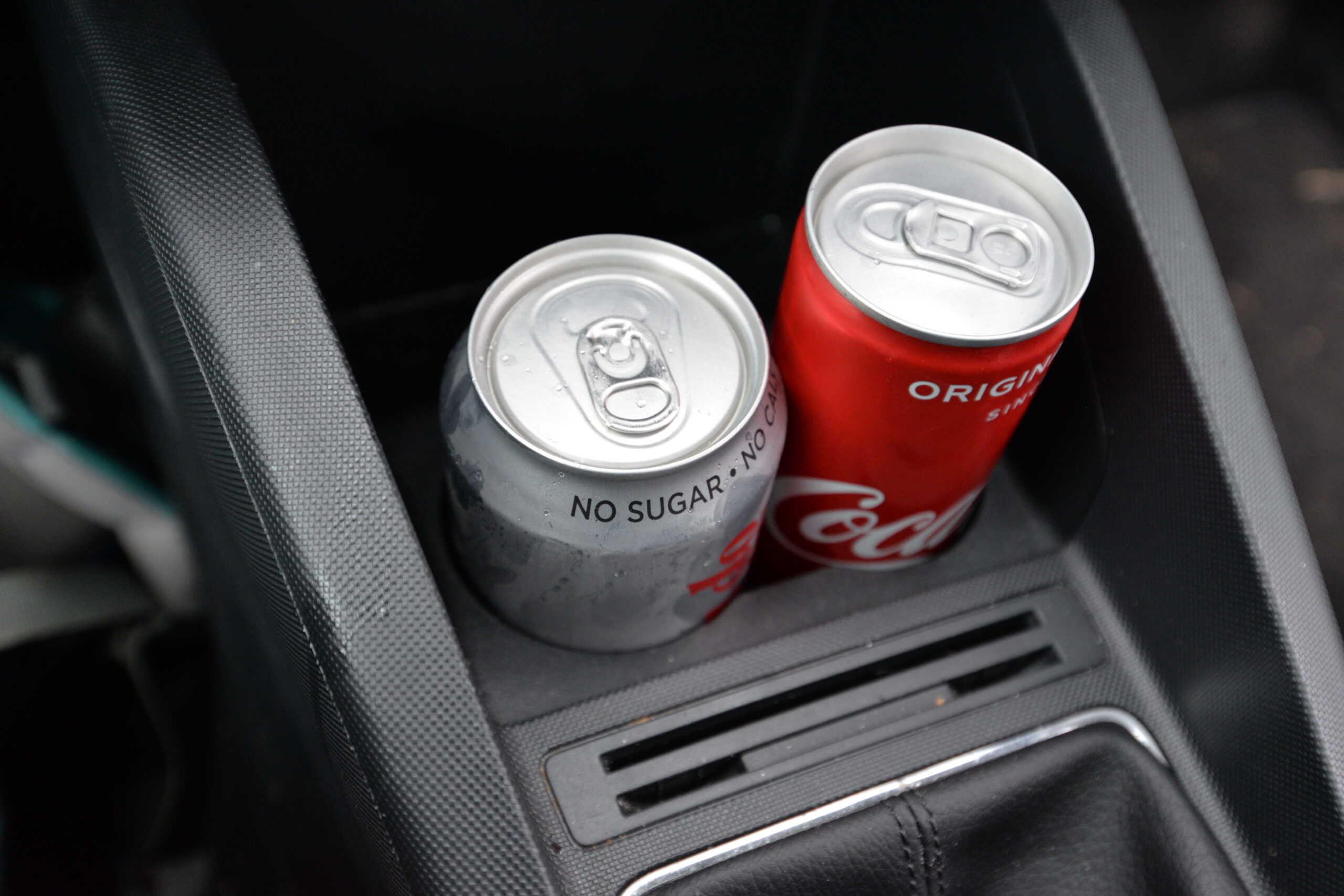 soda cans in car