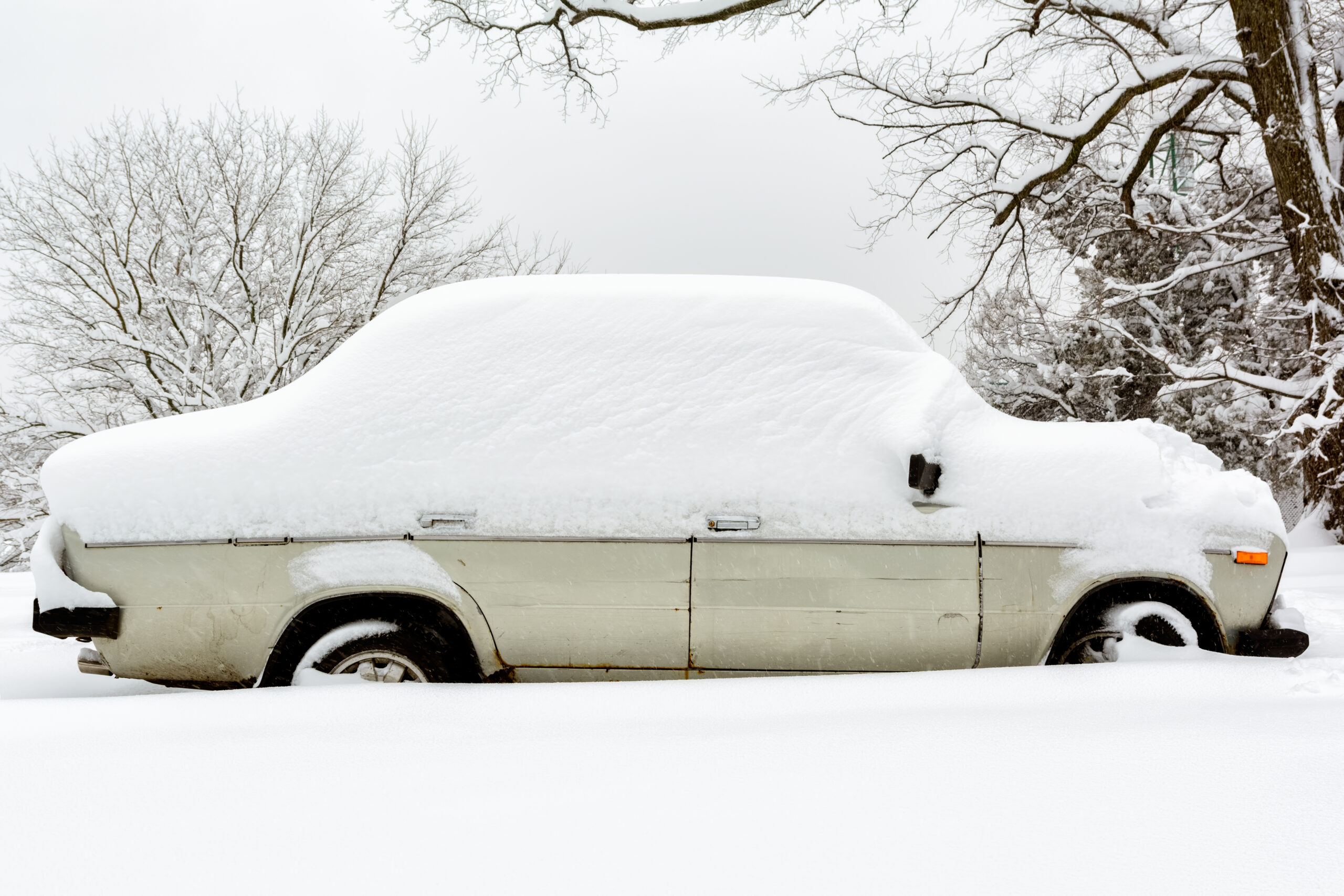 classic car under the snow